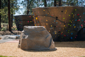 2 climbing bolders in a park